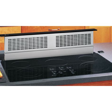 Downdraft vent is installed directly behind the cooktop. GE Appliances 36" Telescopic Downdraft Vent - Appliances ...