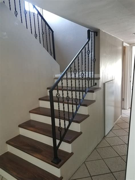 Modern farmhouse satin black/brushed stainless steel round bar can be used either vertically or horizontally. Stair Railing- Xtreme Iron Work | Xtreme Iron Work