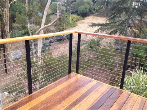 Deck is built on a significant slope and ranges from 2' off the ground to about 6'. DIY Cable Railing - Contemporary - Deck - Other - by San ...