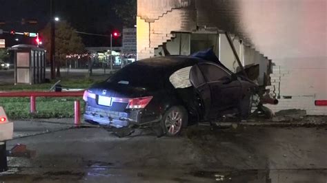 Car Bursts Into Flames After Driver Crashes Into Building In East