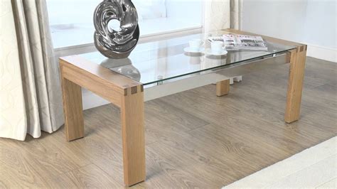 The first dining tables of which survivors remain are the type known as refectory tables. Glass Coffee Table: Cannes Glass/Oak Coffee Table - YouTube