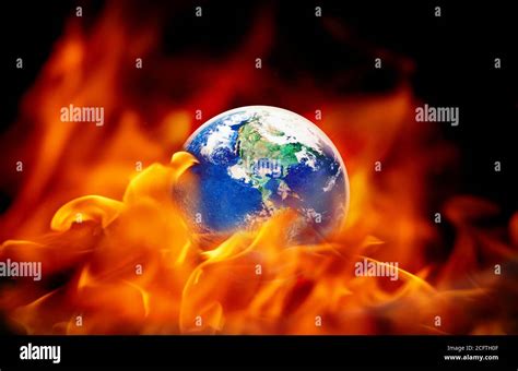 The World On Fire And Global Warming Concept The Globe Earth With Fire
