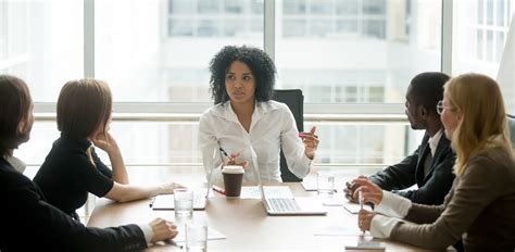 Black Female Boss Leading Corporate Meeting Talking To Diverse