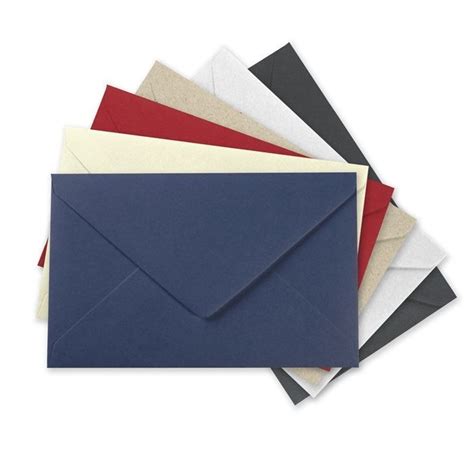 Several Envelopes Are Stacked On Top Of Each Other In Different Colors