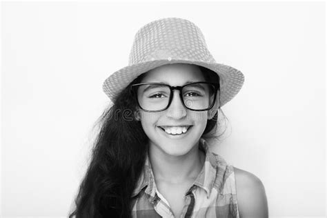 A Beautiful African Young Girl Wearing Glasses And Hat Stock Photo