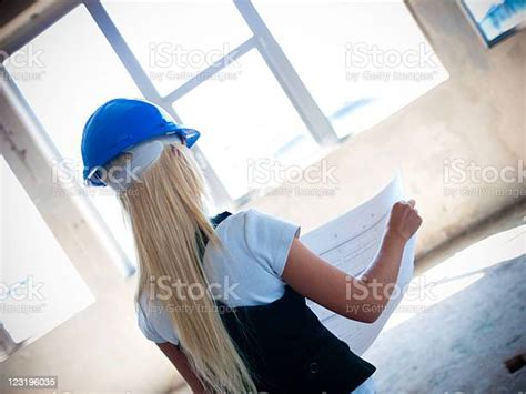 Reviewing Blueprints Stock Photo Download Image Now Adult Adults