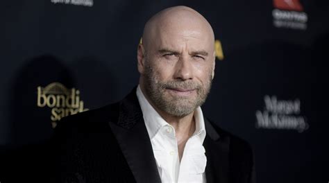 I said, 'well, it's a very different thing,' travolta recalled during the peacock interview, which was released earlier. John Travolta is keeping the cool, bald look and it 'feels great'