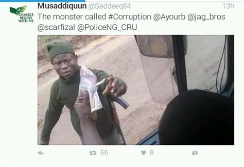 Nigerian Policeman Pictured Collecting Bribe From A Man In A Carphotos