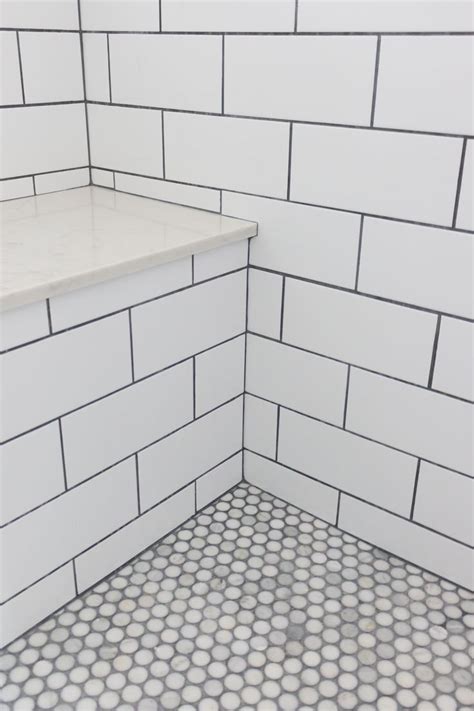 (this fearless couple installed a huge amount of penny tile themselves, and they chronicled the entire. Master bathroom shower. Subway tile with grey grout, stone ...