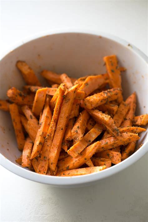 Cut the potatoes into long thin wedges. Baked Sweet Potato Fries | Simple Vegan Blog
