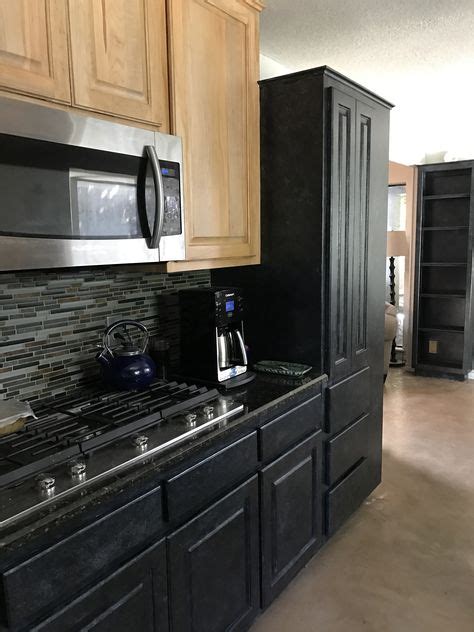 These Black Cabinets Pair Perfectly With The Natural Wood Upper