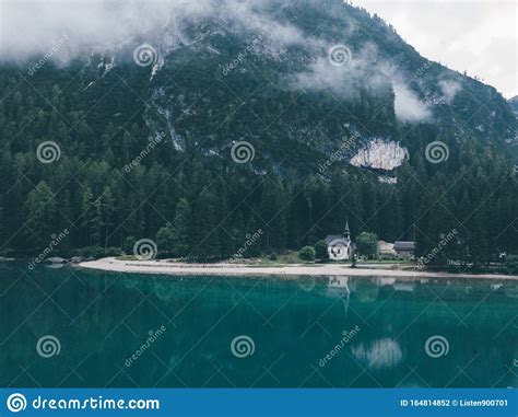 Natural Landscapes Of The Lake Braies Lago Di Braies With Morning Fog