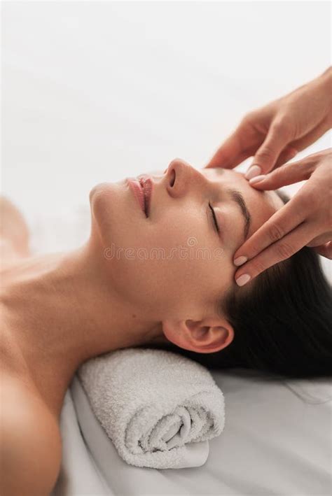 Relaxed Young Lady Lying On Massage Table During Beauty Procedure Stock Image Image Of Lying