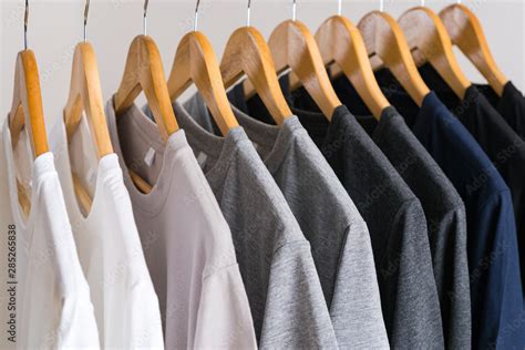 Close Up Of T Shirts On Hangers Apparel Background Stock Photo Adobe