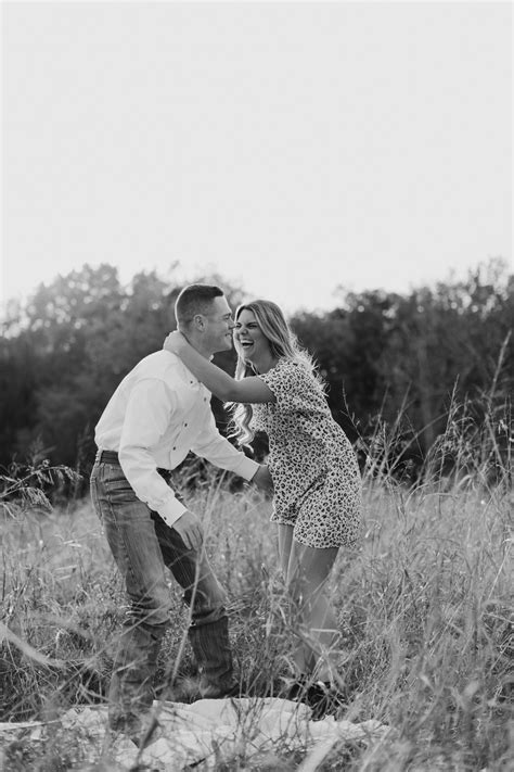 Fun Natural Light Engagement Session In Tall Grass Field Fun Couple Engagement Session