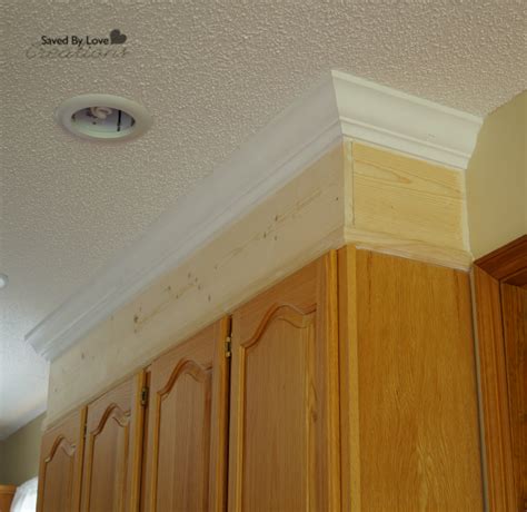Use a moderate amount of glue i.e. DIY Kitchen Cabinet Upgrade With Paint and Crown Molding ...