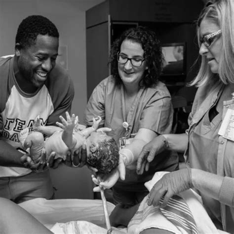 10 Raw Birth Photos Of Dads Welcoming Their Babies Into The World