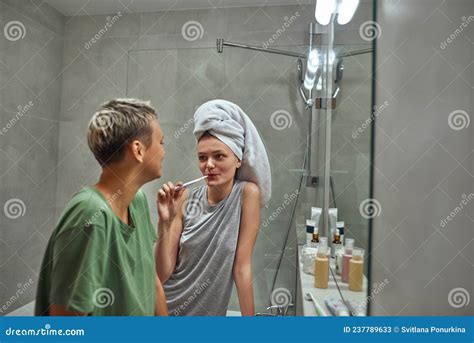 side view of lesbian girls at bathroom at morning stock image image of attractive homosexual