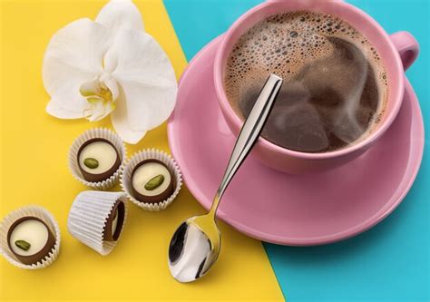 premium photo hot coffee and chocolate sweets