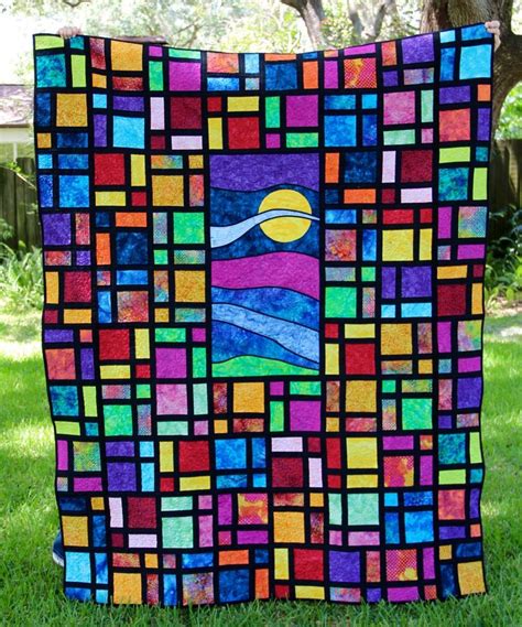 Stained Glass Quilt | Stained glass quilt, Batik quilts, Quilts