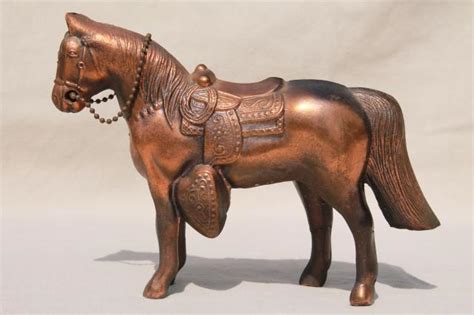 This antique bronze horse statue is painted by green and rust color to make it looks antique. vintage cast metal horse, antique copper finish spelter ...