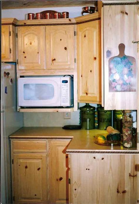 Knotty pine is recognized by its rustic appearance and abundance of beautiful, tight knots throughout the wood. Knotty Pine Cabinets and Kitchens