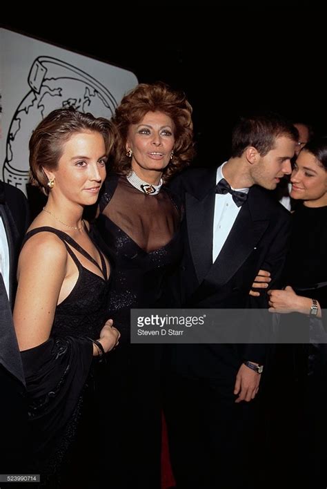 Sophia Loren Arrives At The Golden Globe Awards With Her Sons Eduardo