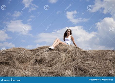 Young Beautiful Woman In The Hayloft In The Village Stock Photo Image