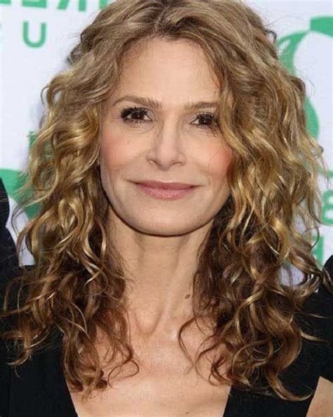 It is one of the current trends in doing a not so dramatic change but reviving your hair is the wave layering. 20 Haircuts for Over 60 | Medium length curly hair, Medium ...