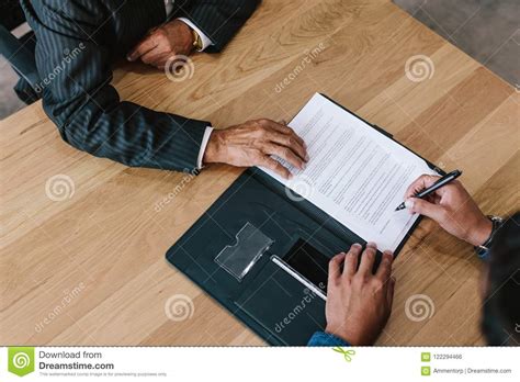 Two Business Men Signing Contract Stock Photo Image Of Young View