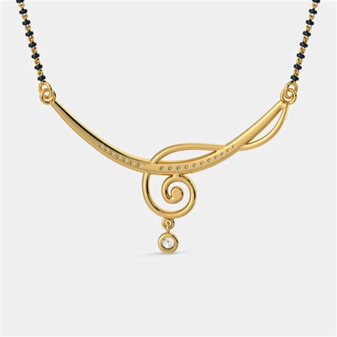 Consisting of a gold ornament strung from a yellow thread, a string of black beads or a gold chain. The Indrani Mangalsutra | BlueStone.com