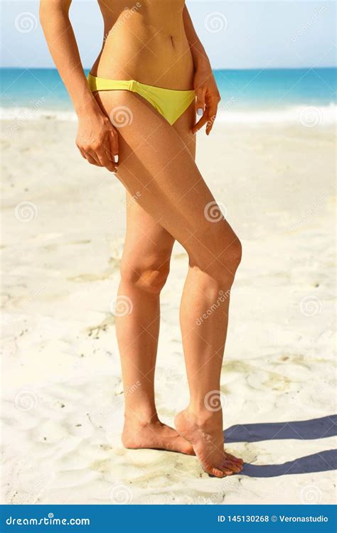 Sexy Slim Women Legs On The Beach Stock Photo Image Of Bronze