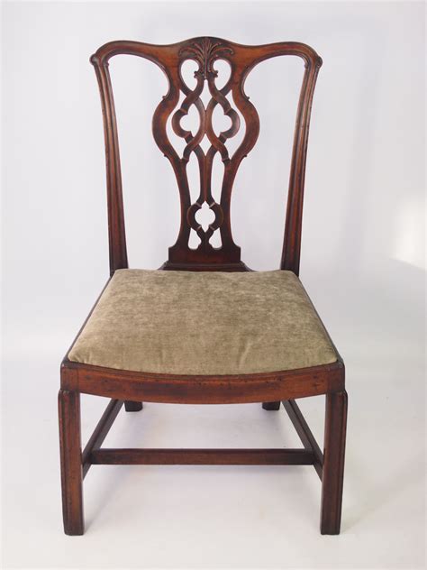 One of the basic pieces of furniture, a chair is a type of seat. Antique Georgian Mahogany Chippendale Chair Stamped "AF"