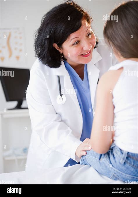 Hispanic Doctor Talking To Patient Stock Photo Alamy