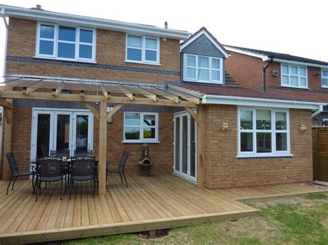 Extension With Part Covered Decking Finished With Oak Timber