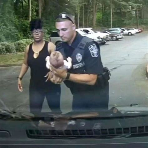 Police Officer Saving Someone