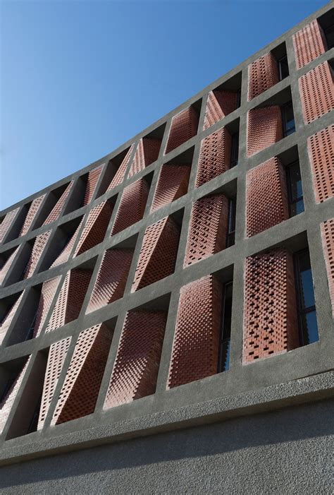 Perforated Brick Screens Act As Curtains For Tehran Housing