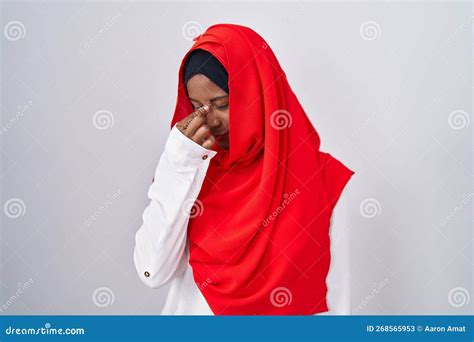 Young Arab Woman Wearing Traditional Islamic Hijab Scarf Tired Rubbing