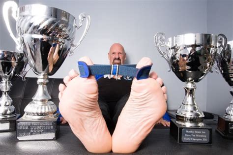 Toe Wrestling Champion Tries To Insure His Prize Toe For £1million