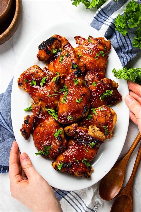 Baking the thighs at a high temp means less time spent in the. Juicy and Tender Oven Baked BBQ Chicken Thighs in 2020 ...