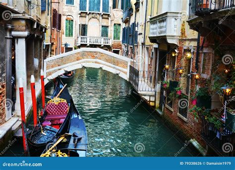 Gondolas And Illuminated Street Lamps Venice Italy Stock Photo