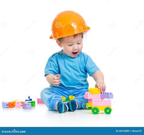 Boy Is Playing With Building Blocks Stock Photo