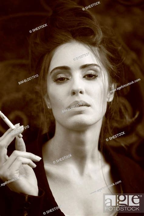 Caucasian Woman Smoking Cigarette Stock Photo Picture And Royalty