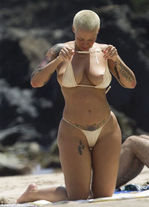 Topless Amber Rose Suns Herself In A Thong Bikini On Hawaiian Beach