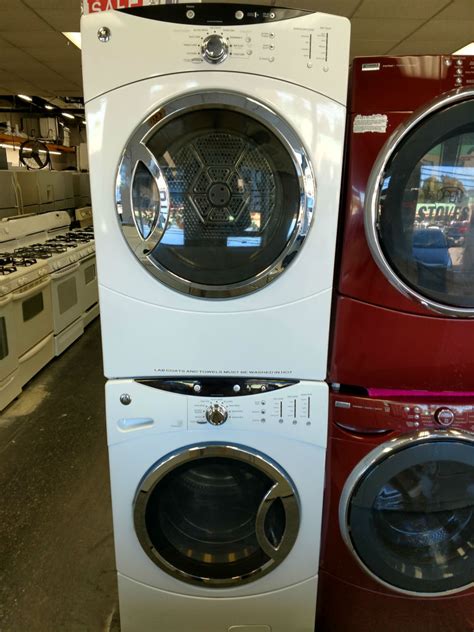 White stackable washer dryer - PG Used Appliances