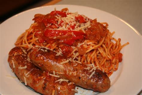 After your potatoes, peppers and onions have been cooking for 20 minutes, pull from the oven, stir and place sausage on top. COOK WITH SUSAN: Spaghetti with Italian Sausage, Peppers ...
