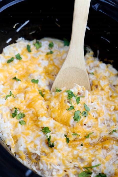 To begin, you will combine chopped onion, uncooked long grain brown rice, seasonings, and broth in your slow cooker. Slow Cooker Chicken and Rice Casserole • The Diary of a ...