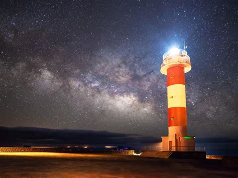 Wallpaper Lighthouse Starry Sky Milky Way Night Shore Hd