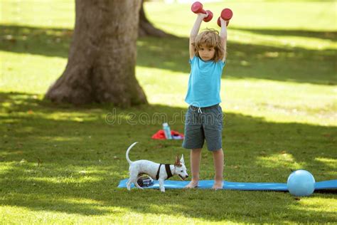 Sport Child Boy With Strong Biceps Muscles Kids Exercising Fitness