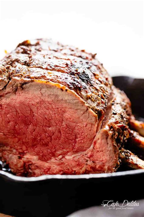 Read our guide to buying and carving prime rib (before you hit the meat market) and check out our guide to christmas dinner after 30 minutes, season the meat on all sides with the fleur de sel and cracked black pepper. Garlic Herb Prime Rib - Cafe Delites
